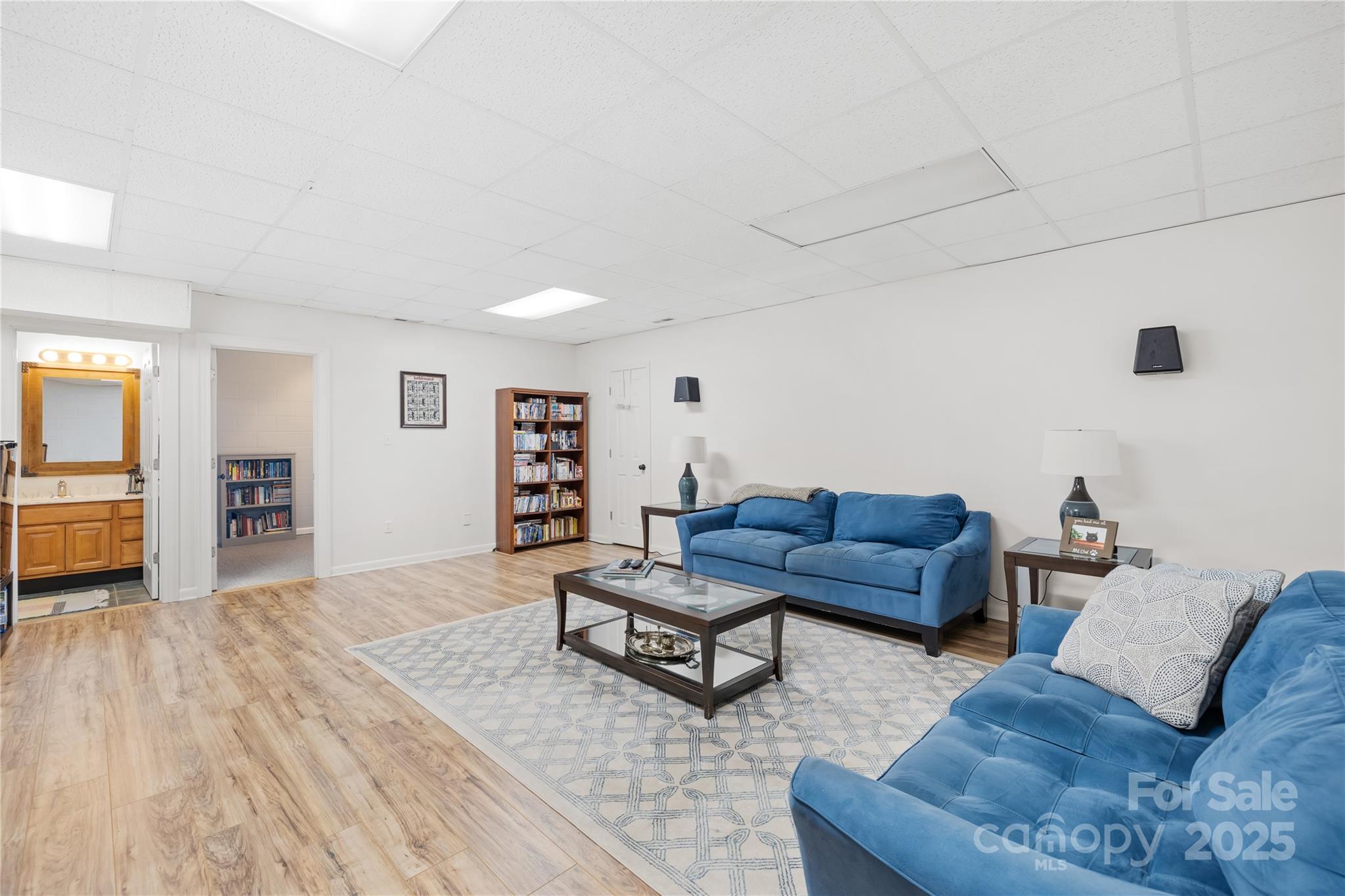 675 Normandy Road Mooresville, NC 28117 - Photo 29 of 36 a living room with furniture and wooden floor