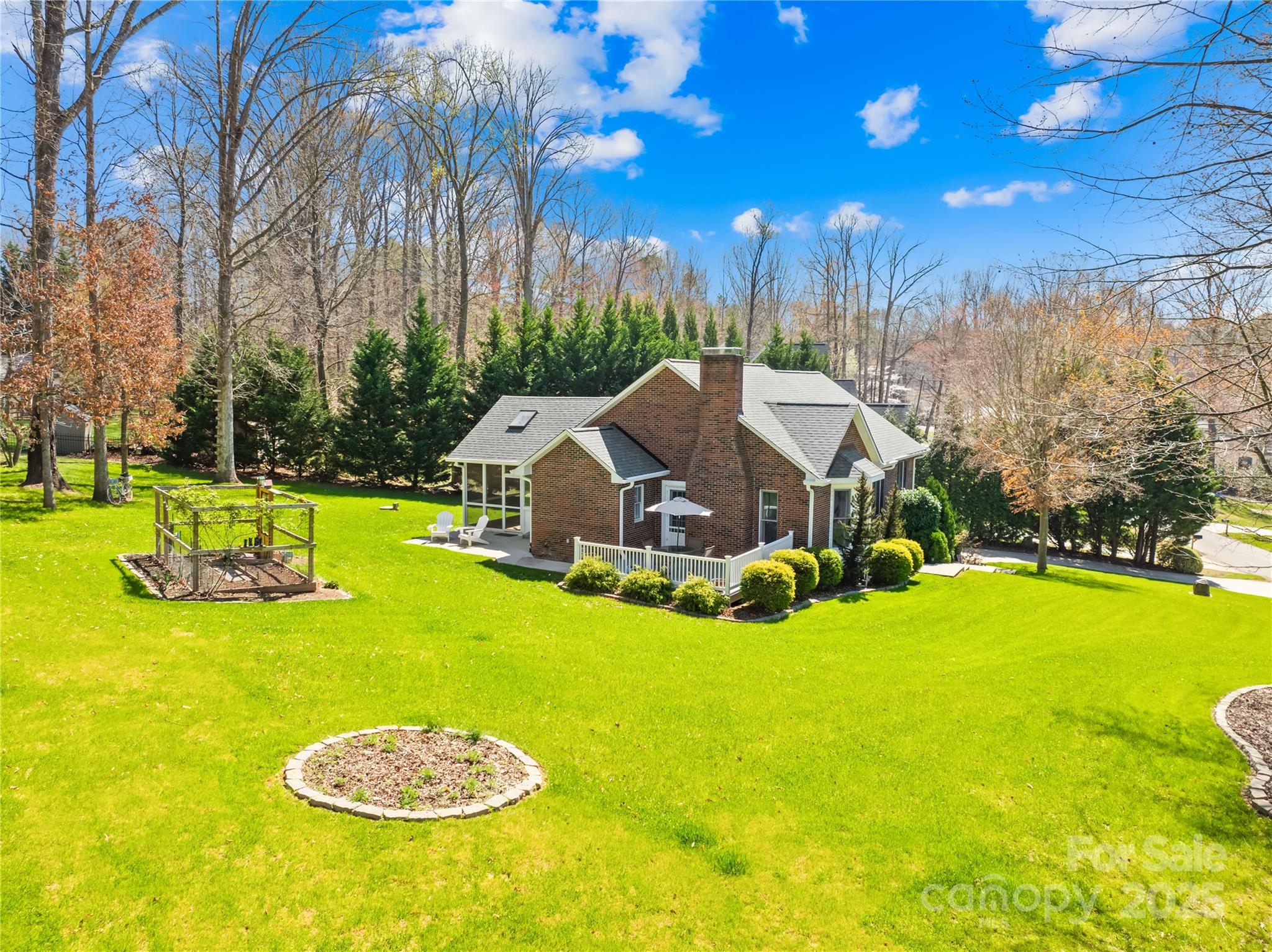 675 Normandy Road Mooresville, NC 28117 - Photo 3 of 36 a view of a house with swimming pool and yard