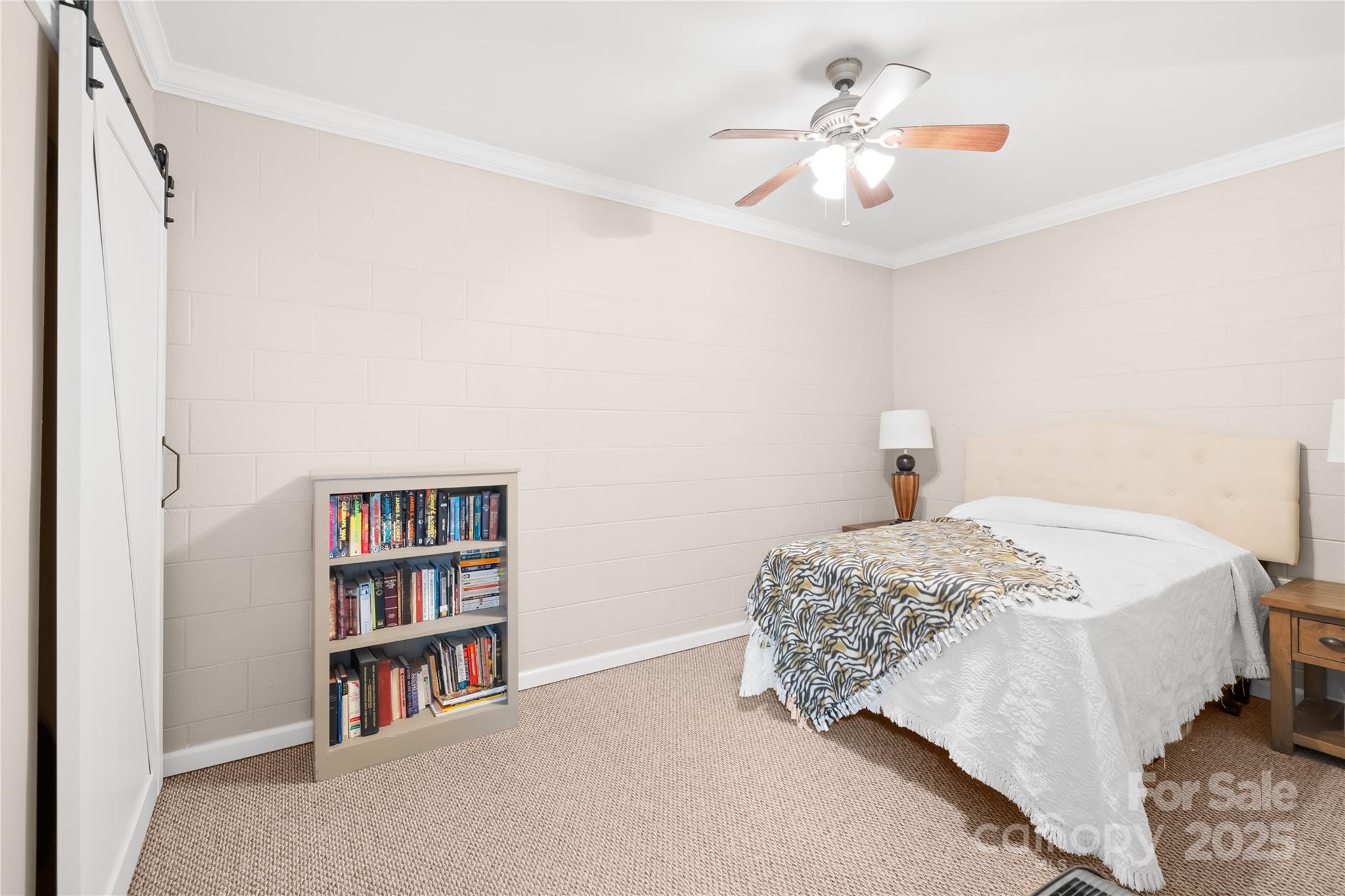 675 Normandy Road Mooresville, NC 28117 - Photo 31 of 36 a bedroom with a bed and a book shelf