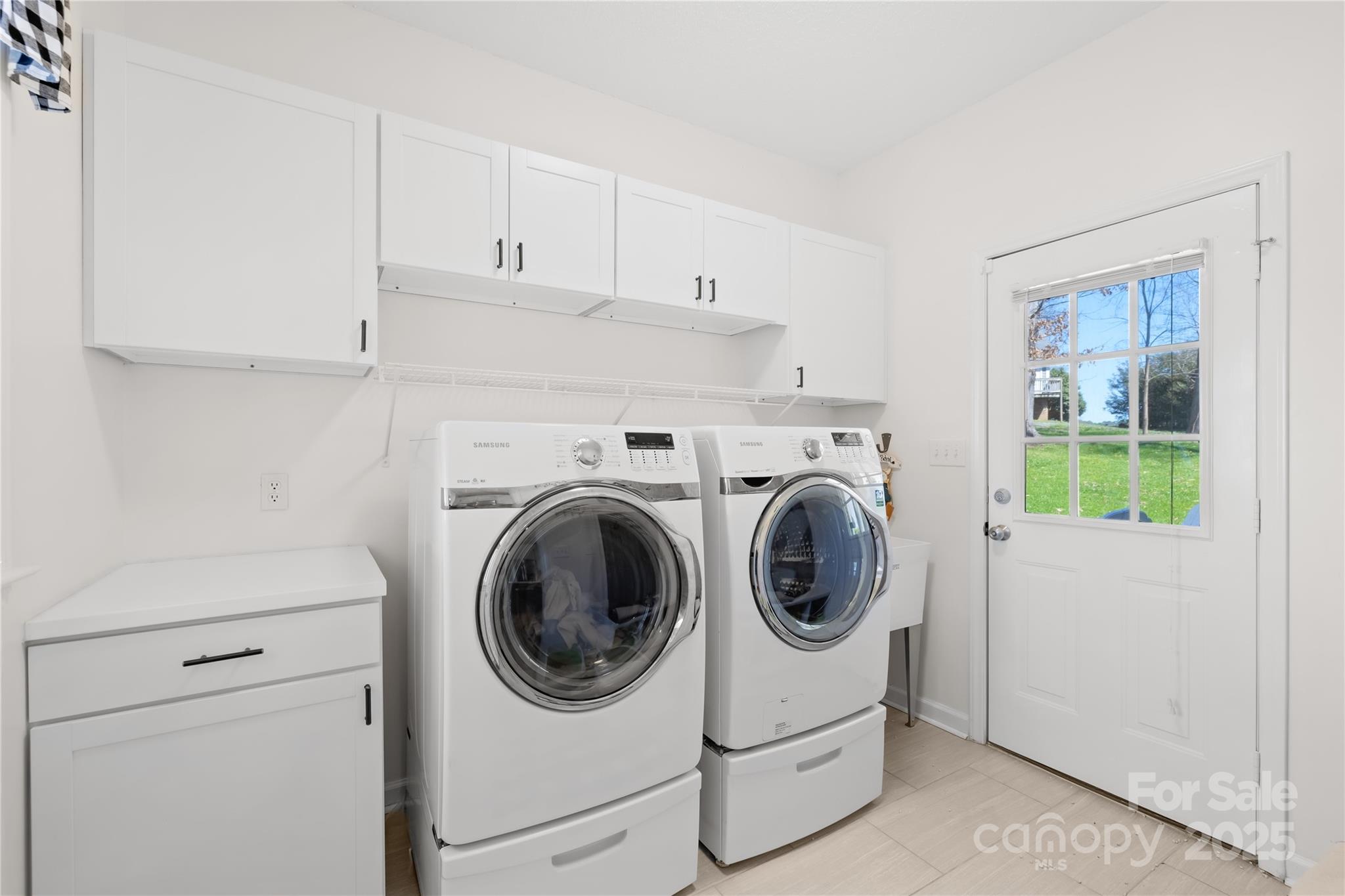 675 Normandy Road Mooresville, NC 28117 - Photo 36 of 36 a utility room with dryer and washer