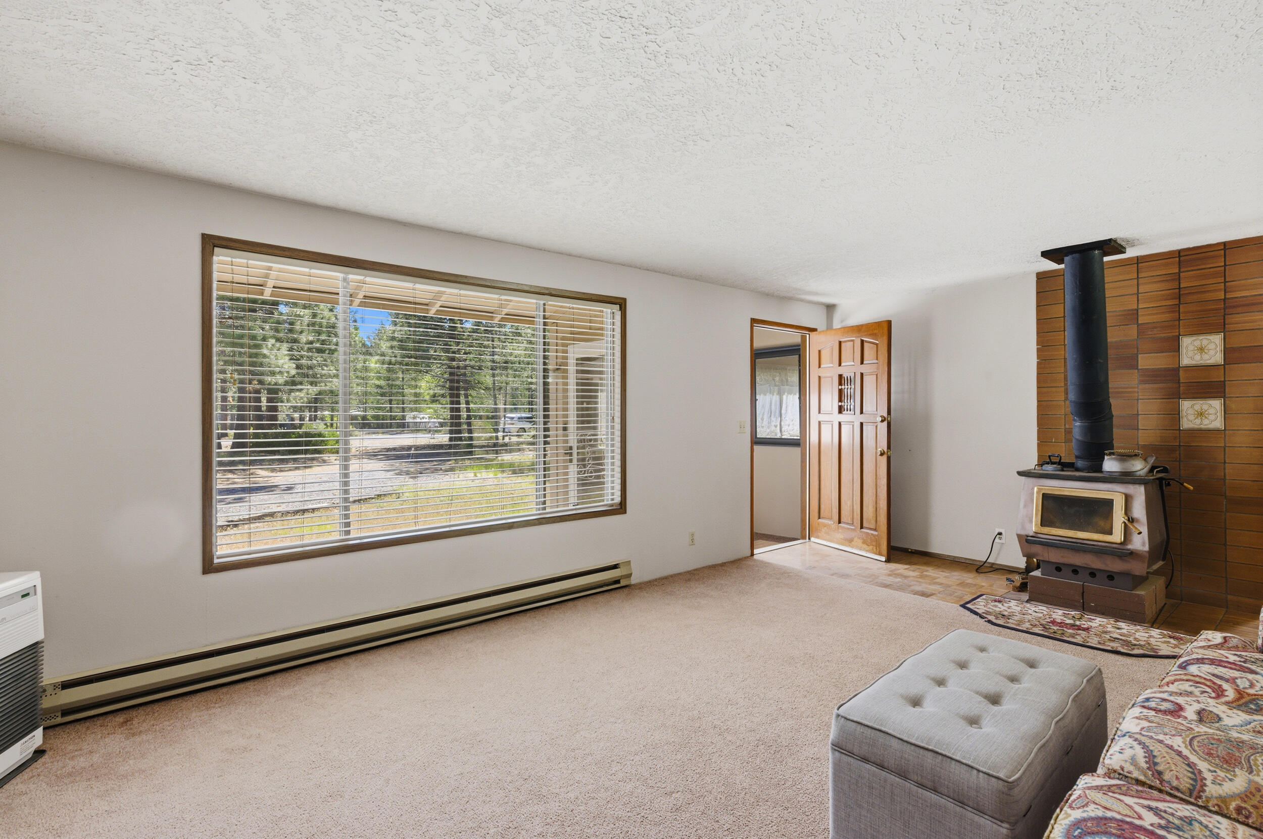50868 Doe Loop La Pine, OR 97739 - Photo 9 of 51 a living room with furniture and a window