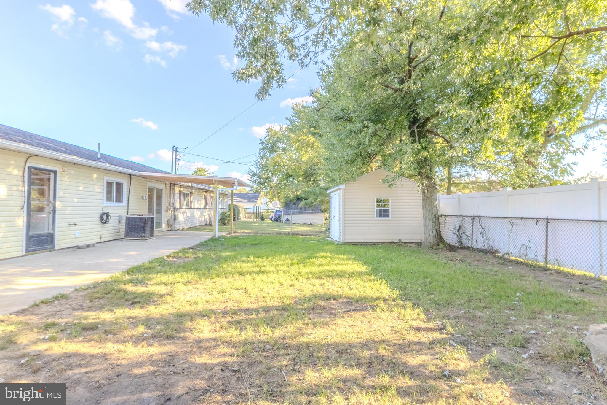 2106 North Rolling Road Windsor Mill, MD 21244 - Photo 25 of 26 a view of a house with a swimming pool