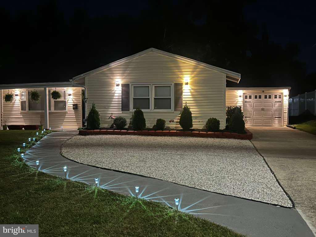 2106 North Rolling Road Windsor Mill, MD 21244 - Photo 4 of 26 a front view of a house with a yard