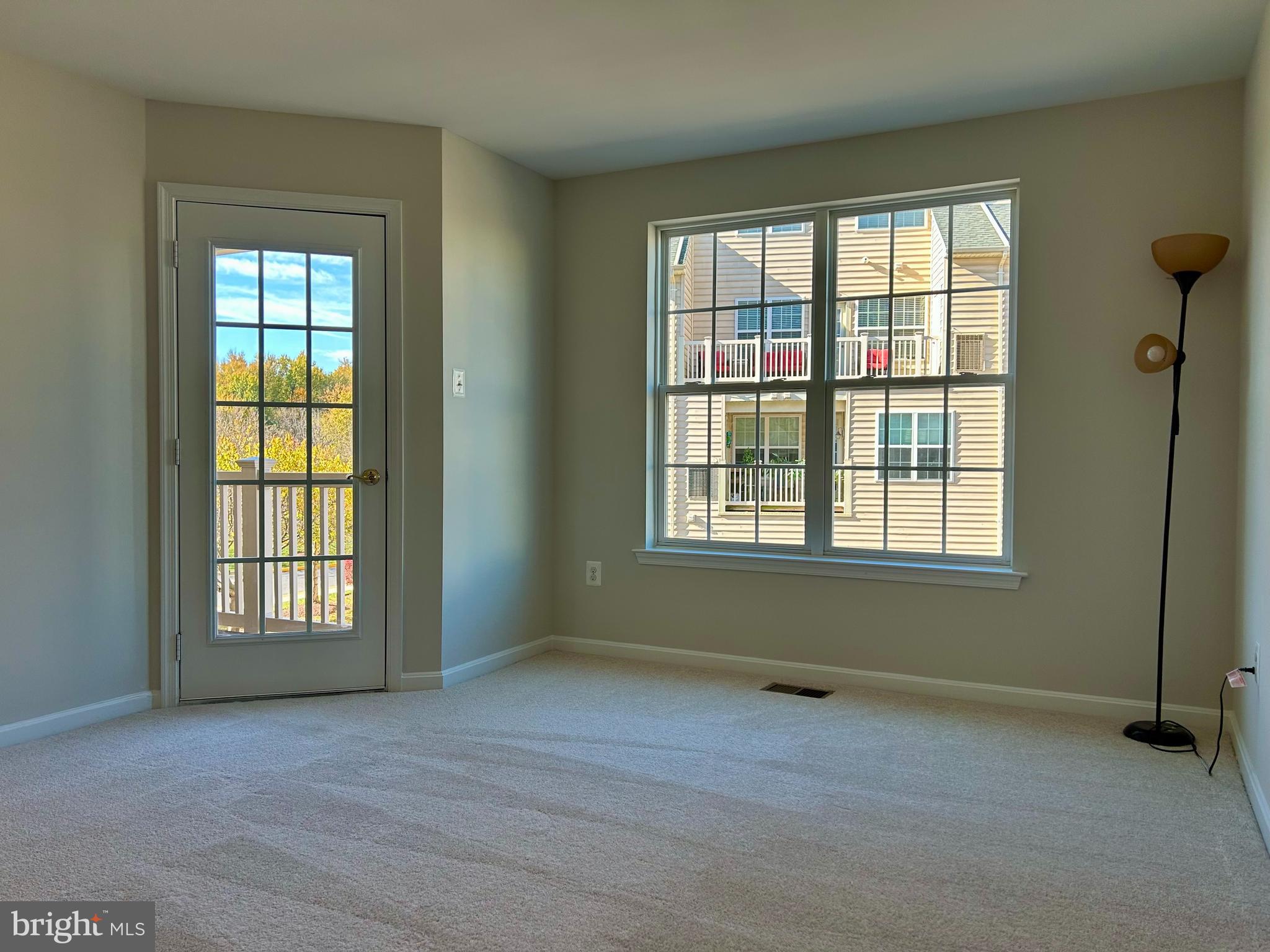 1846 Monocacy View Circle, Unit 64A Frederick, MD 21701 - Photo 8 of 13 an empty room with a window