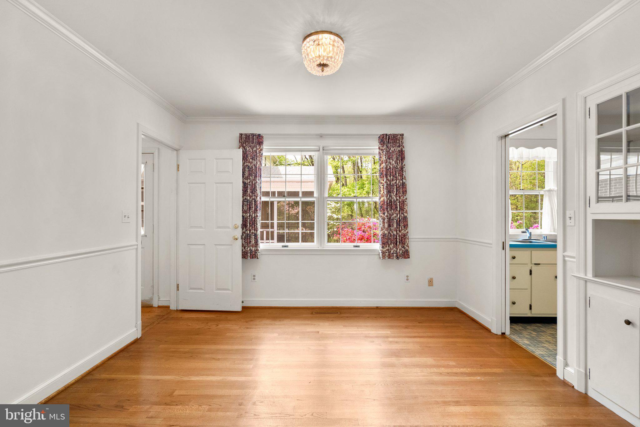 4811 Olney Laytonsville Road Olney, MD 20832 - Photo 21 of 63 an empty room with windows and closet