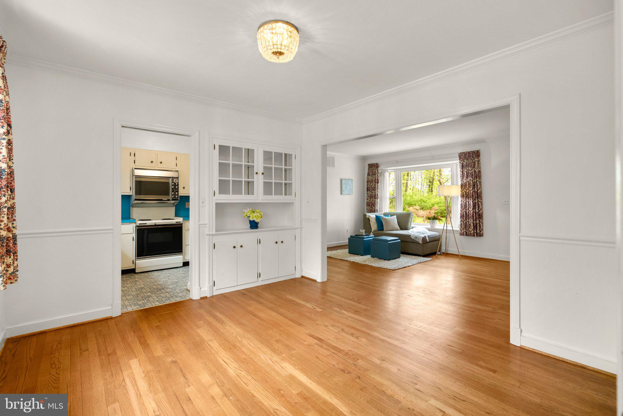 4811 Olney Laytonsville Road Olney, MD 20832 - Photo 22 of 63 a view of a living room and a wooden floor