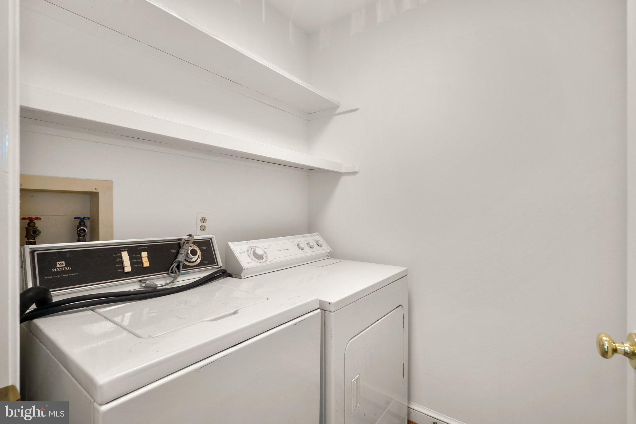 4811 Olney Laytonsville Road Olney, MD 20832 - Photo 29 of 63 a utility room with dryer and washer