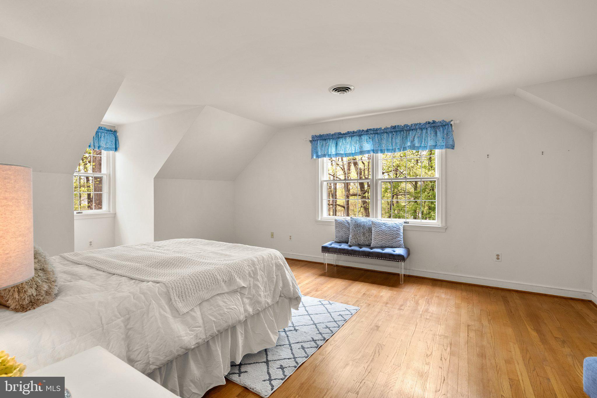 4811 Olney Laytonsville Road Olney, MD 20832 - Photo 34 of 63 a bedroom with a bed and a window