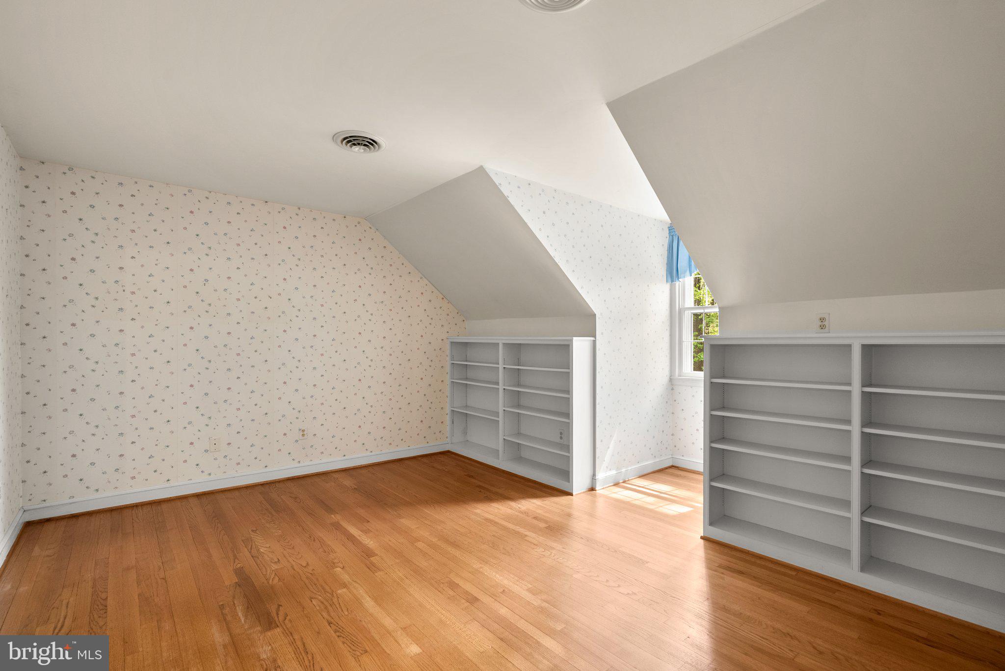 4811 Olney Laytonsville Road Olney, MD 20832 - Photo 39 of 63 a view of an empty room and wooden floor and closet