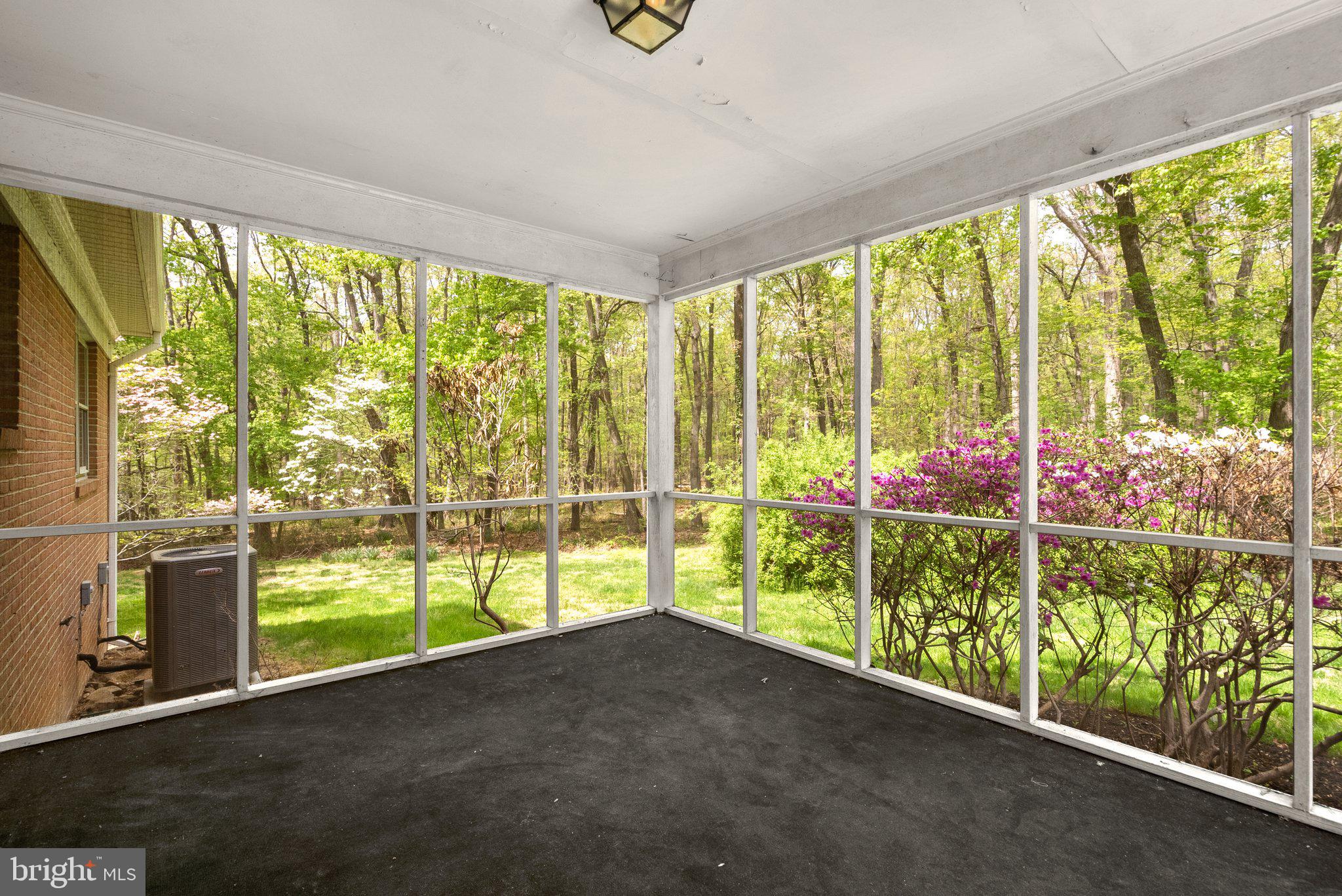 4811 Olney Laytonsville Road Olney, MD 20832 - Photo 51 of 63 a view of porch with furniture and floor to ceiling window