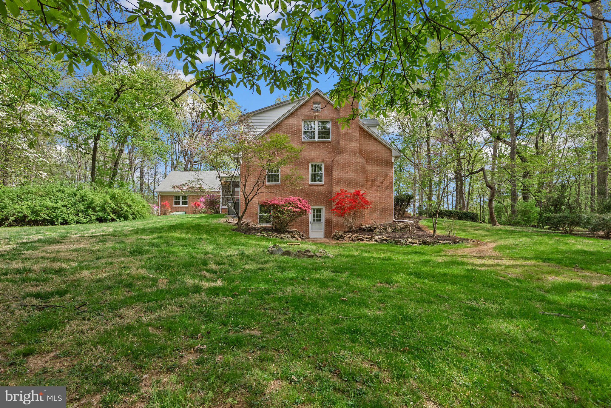 4811 Olney Laytonsville Road Olney, MD 20832 - Photo 54 of 63 a front view of house with garden