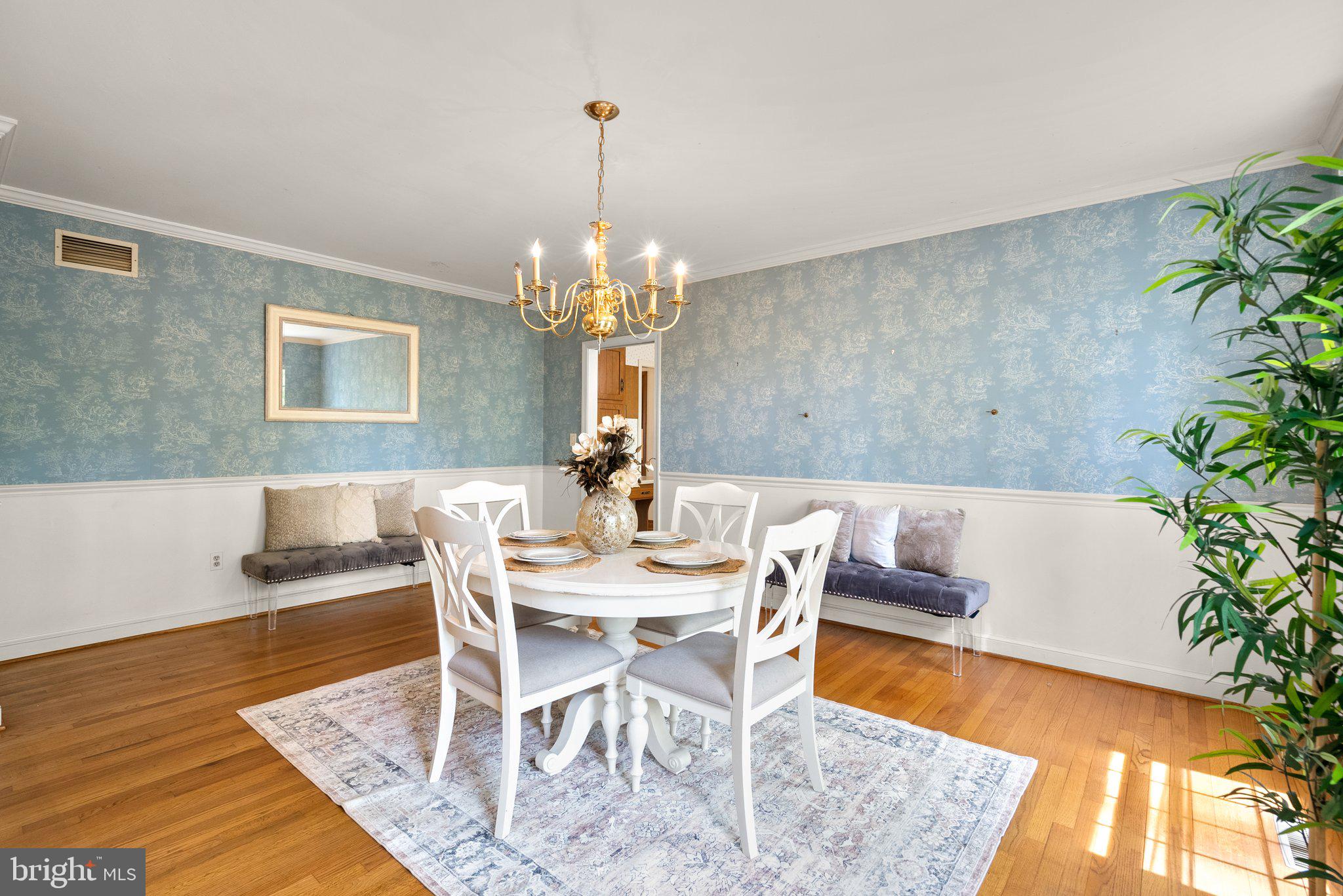 4811 Olney Laytonsville Road Olney, MD 20832 - Photo 9 of 63 a view of a dining room with furniture and chandelier