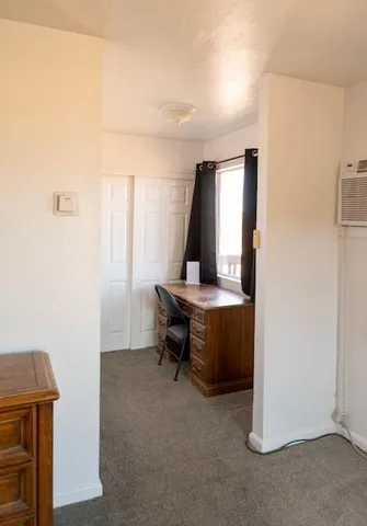 a room with furniture and window