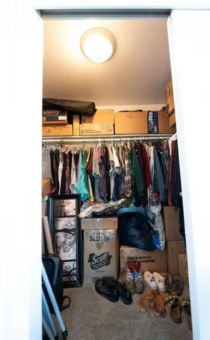 a view of a house with a small yard