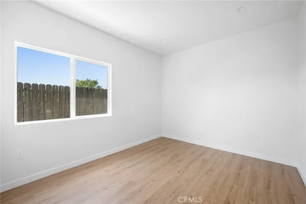 a view of a room that has a window in it