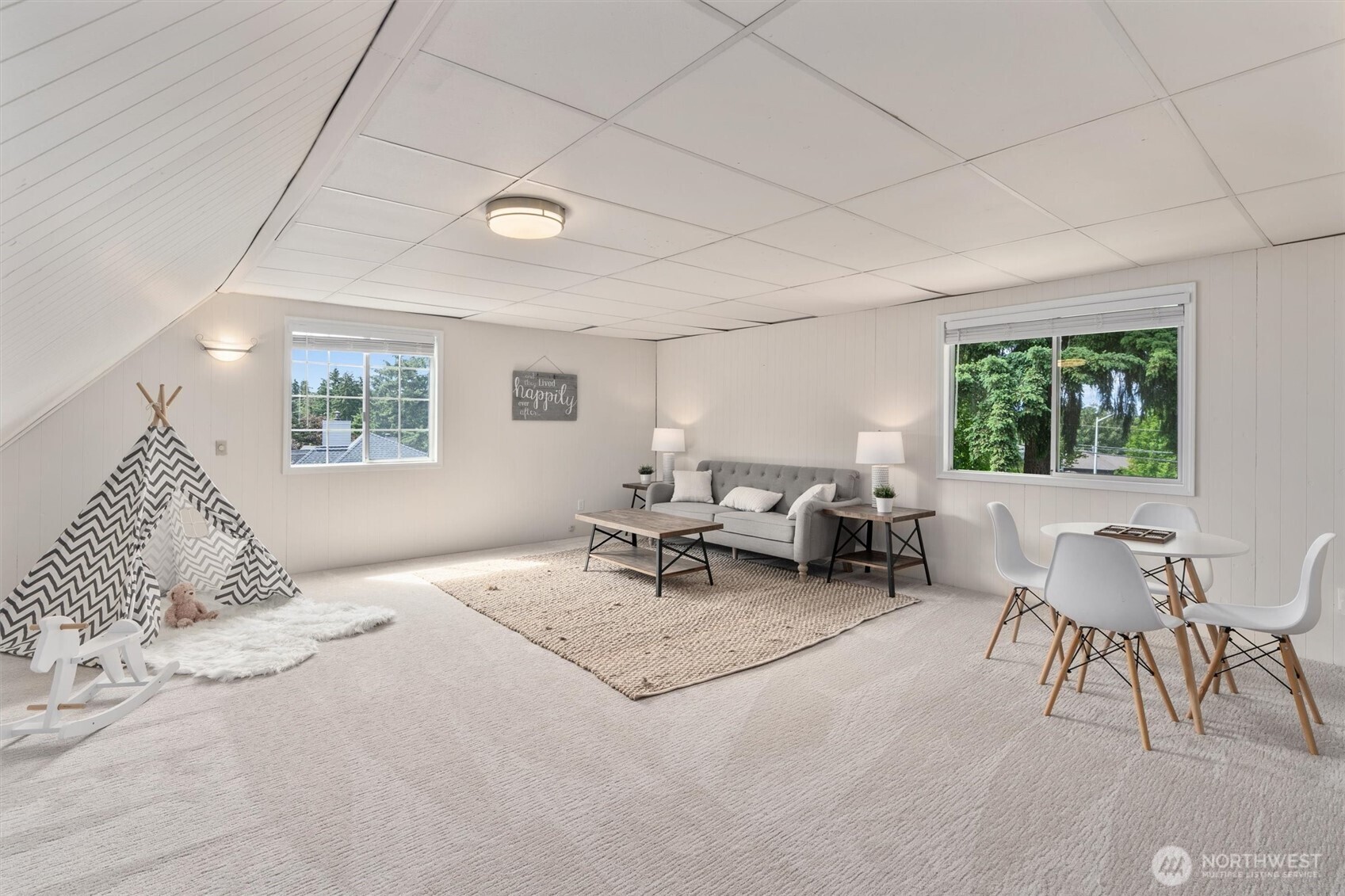 2101 233rd Street Southeast Bothell, WA 98021 - Photo 21 of 40 a bedroom with furniture and a large window