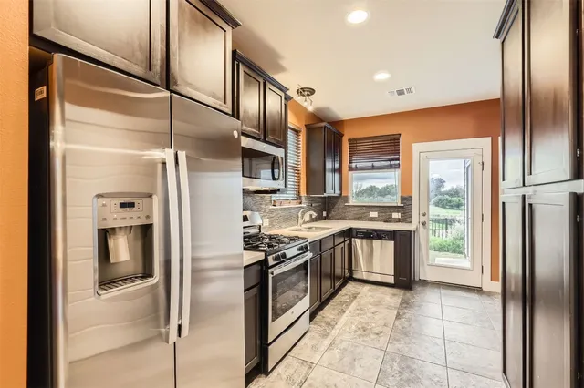 $494,990 | 7324 Easy Wind Drive, Austin, TX 78757