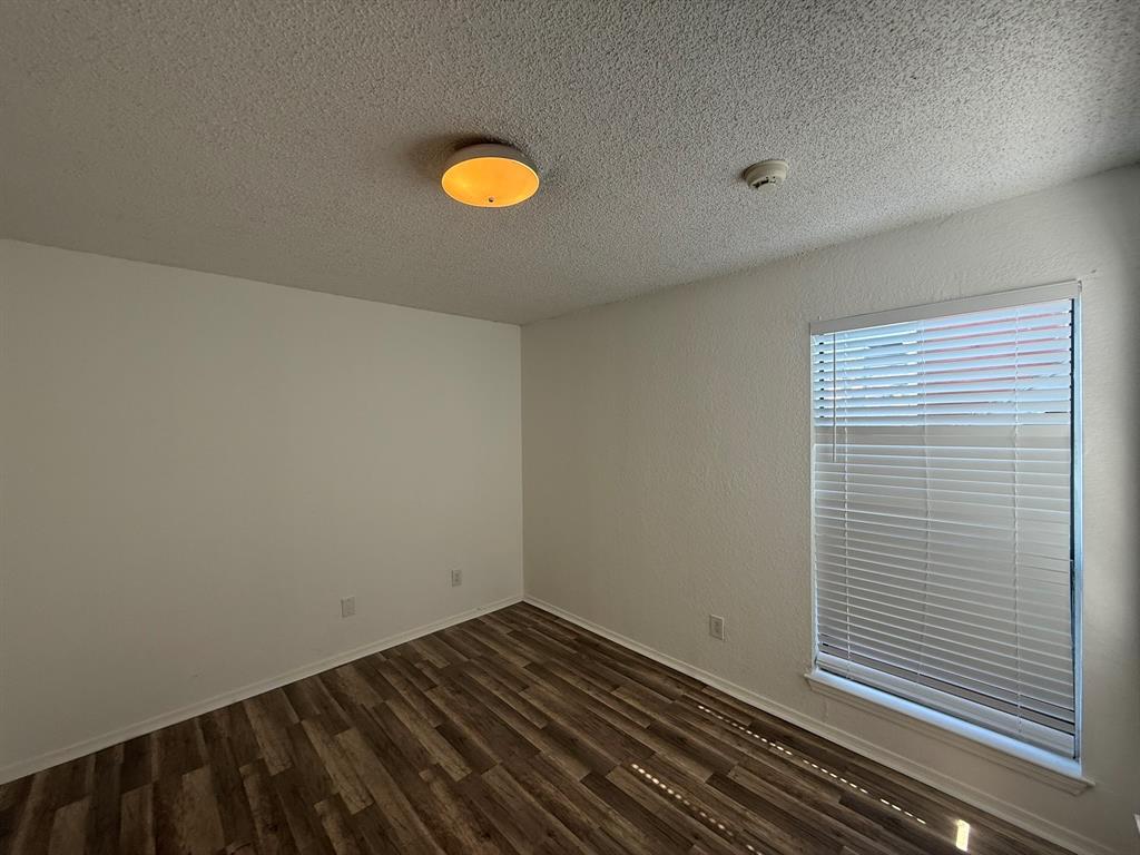 9813 Walnut Street, Unit 302 Dallas, TX 75243 - Photo 3 of 7 a view of a room