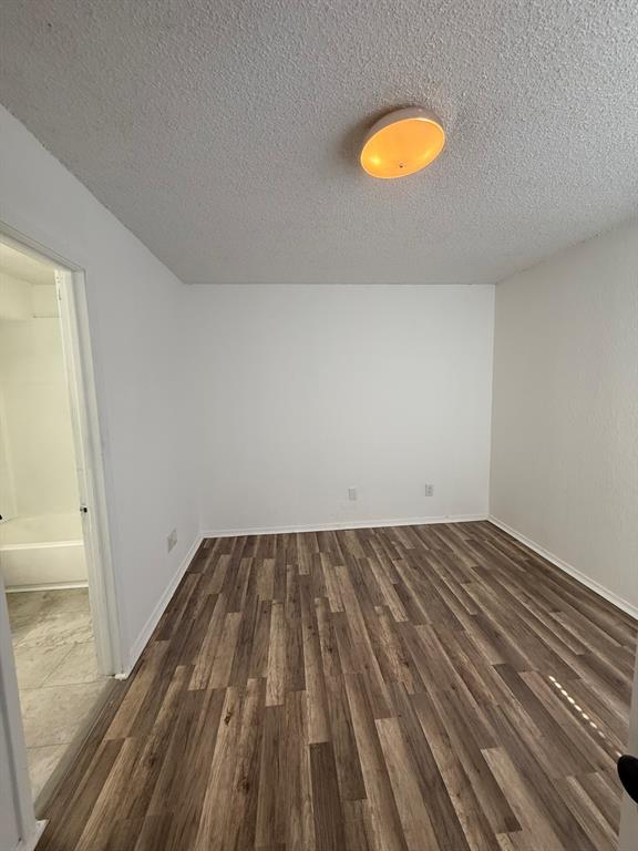 9813 Walnut Street, Unit 302 Dallas, TX 75243 - Photo 6 of 7 a view of a room