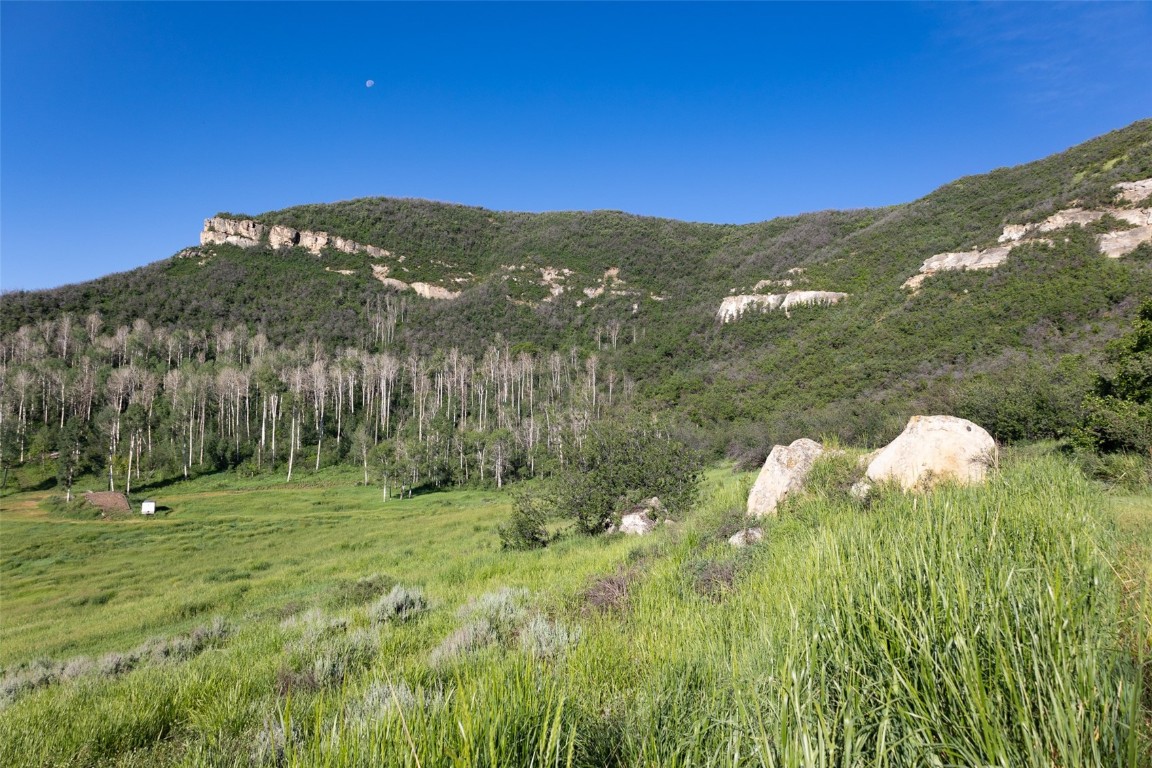 Tbd Grouse Ridge Lane Steamboat Springs, CO 80487 - Photo 13 of 33 a view of a city with a mountain in the background