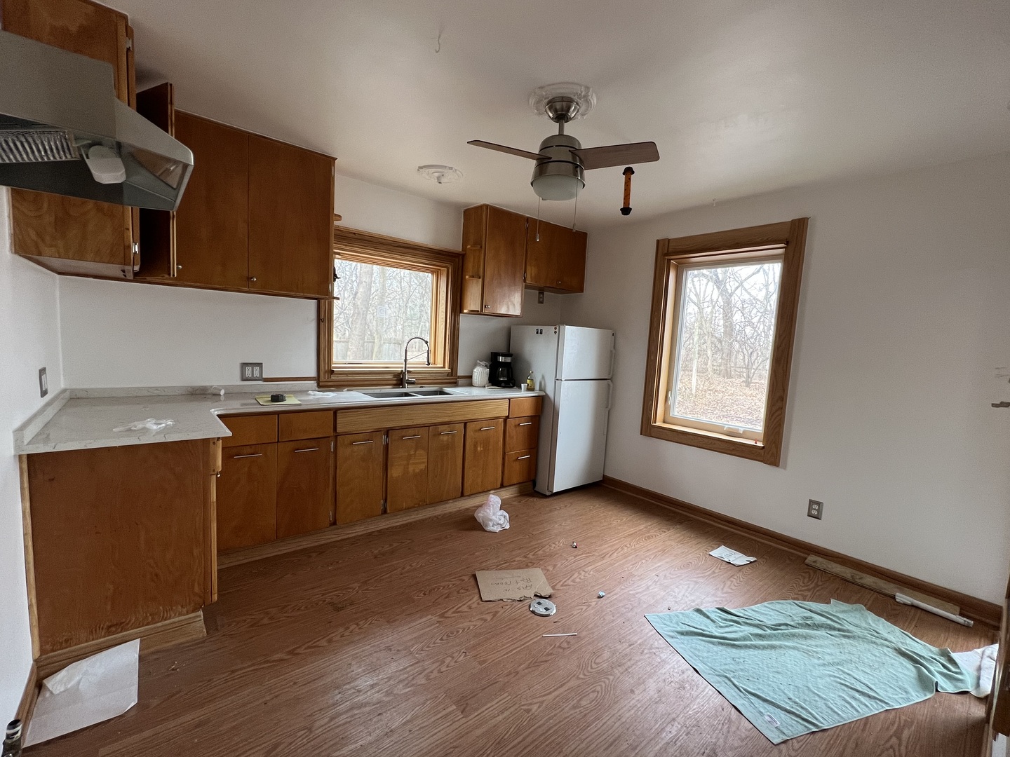 1328 Burr Oak Road Homewood, IL 60430 - Photo 8 of 22 a kitchen with a sink cabinets and window
