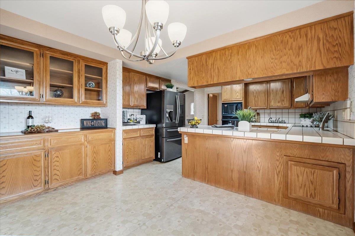 363 Diamond Oaks Road Roseville, CA 95678 - Photo 16 of 51 View from kitchen nook. Room for table and chairs along with a couple of bar stools if desired.