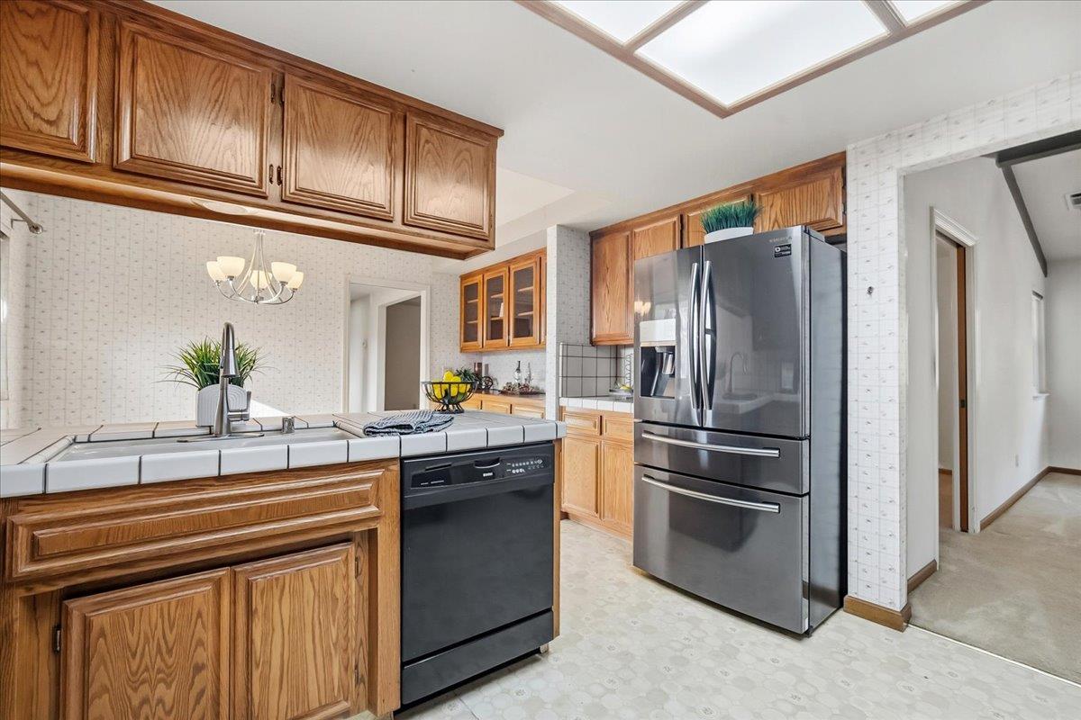 363 Diamond Oaks Road Roseville, CA 95678 - Photo 18 of 51 Kitchen with original classic layout - the ultimate blank canvas. View of spacious dining nook. Cozy Family room is located to the right of this photo.
