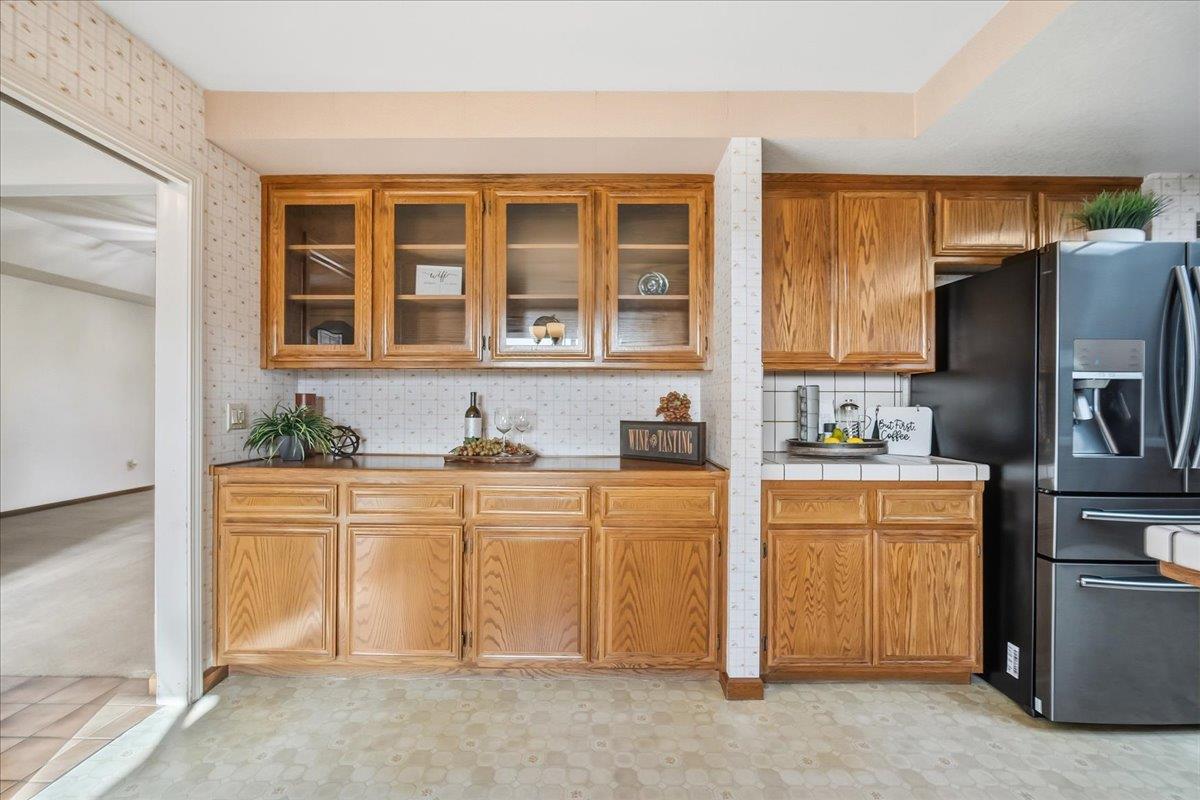 363 Diamond Oaks Road Roseville, CA 95678 - Photo 19 of 51 A bright dining nook adjacent to the kitchen with buffet style cabinets for storage.