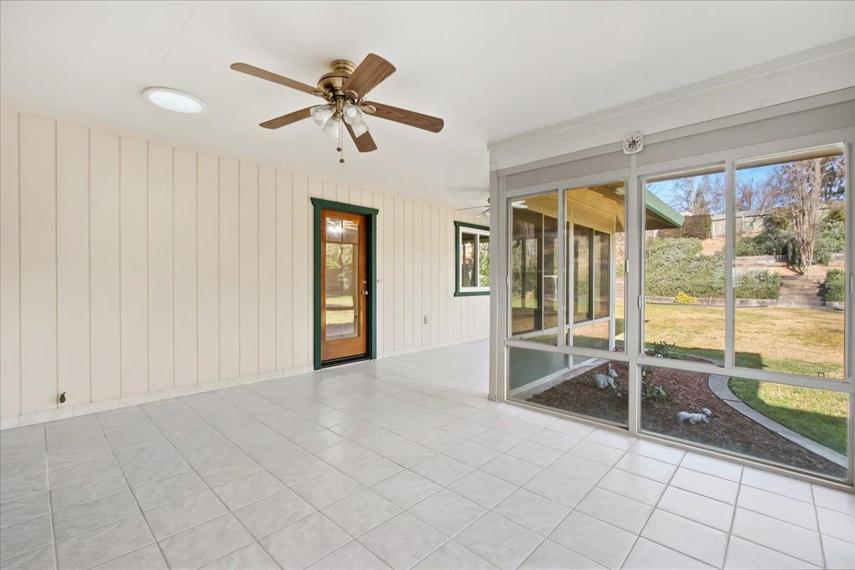 363 Diamond Oaks Road Roseville, CA 95678 - Photo 38 of 51 A fluid transition space: this expansive enclosed patio features private portals to the primary suite, the main living area, and the backyard.