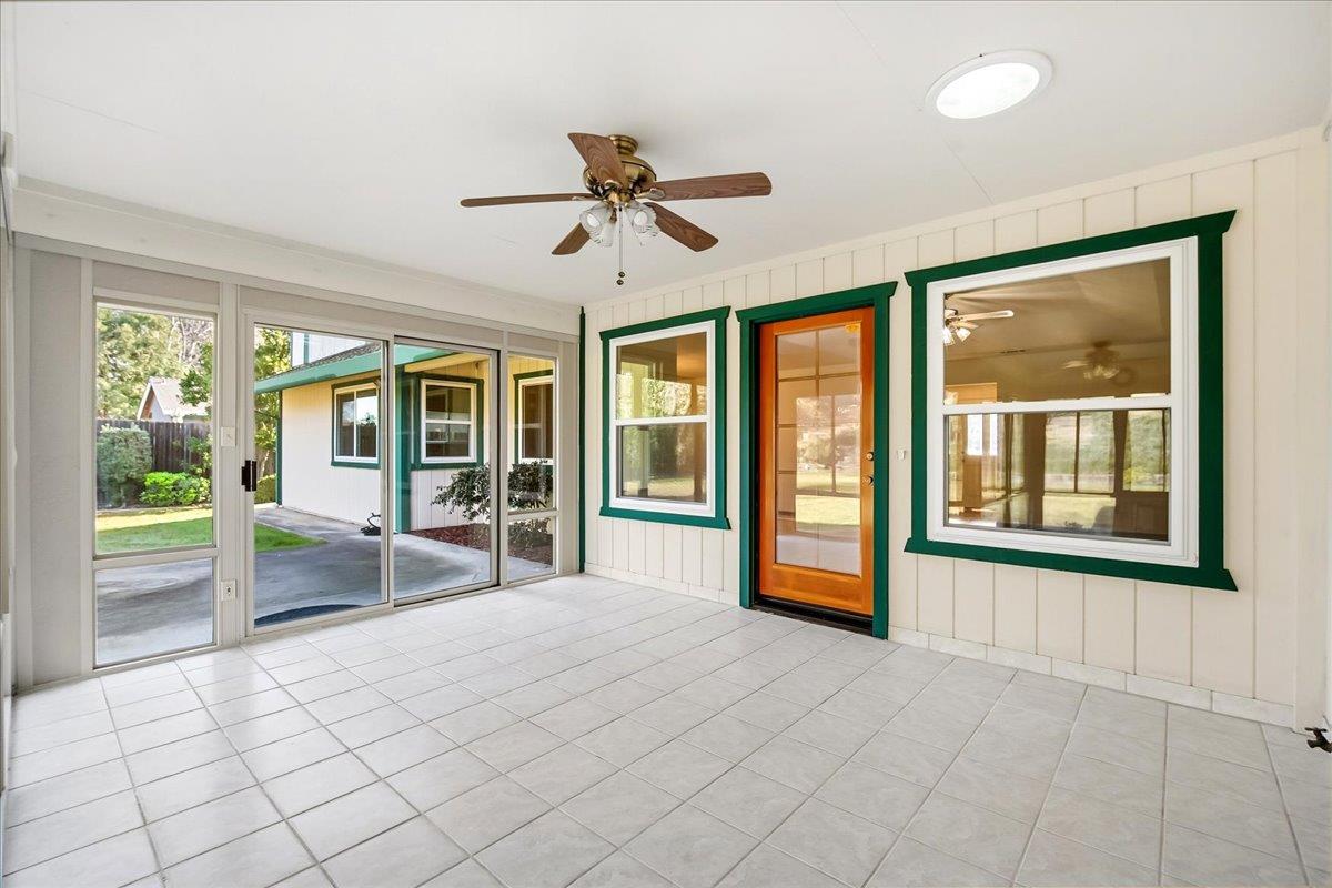 363 Diamond Oaks Road Roseville, CA 95678 - Photo 39 of 51 A fluid transition space: this expansive enclosed patio features private portals to the primary suite, the main living area, and the backyard.