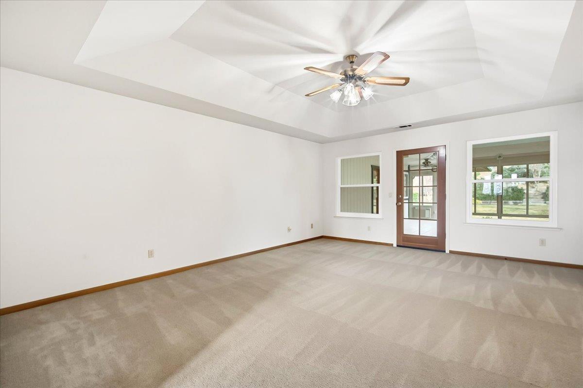 363 Diamond Oaks Road Roseville, CA 95678 - Photo 8 of 51 Formal Living area looking out to the enclosed patio, with sliding door accessing the backyard.