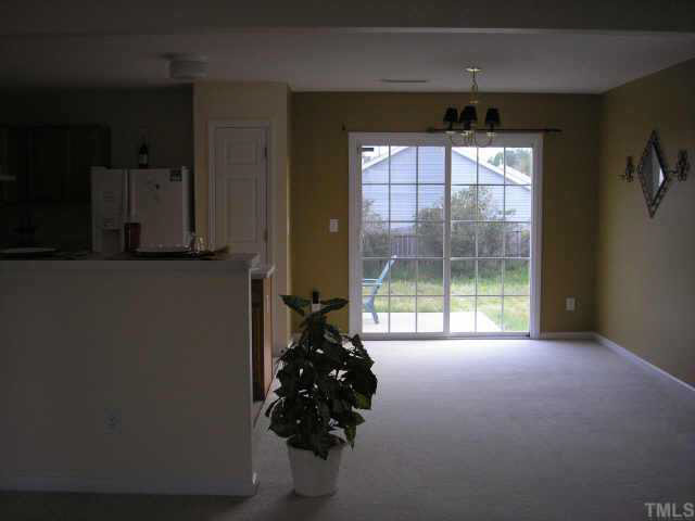 5704 Bryanstone Place Raleigh, NC 27610 - Photo 7 of 10 a room with a window
