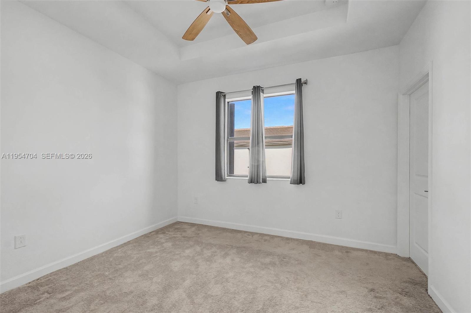 12947 Southwest 234th Street Homestead, FL 33032 - Photo 16 of 33 a view of an empty room