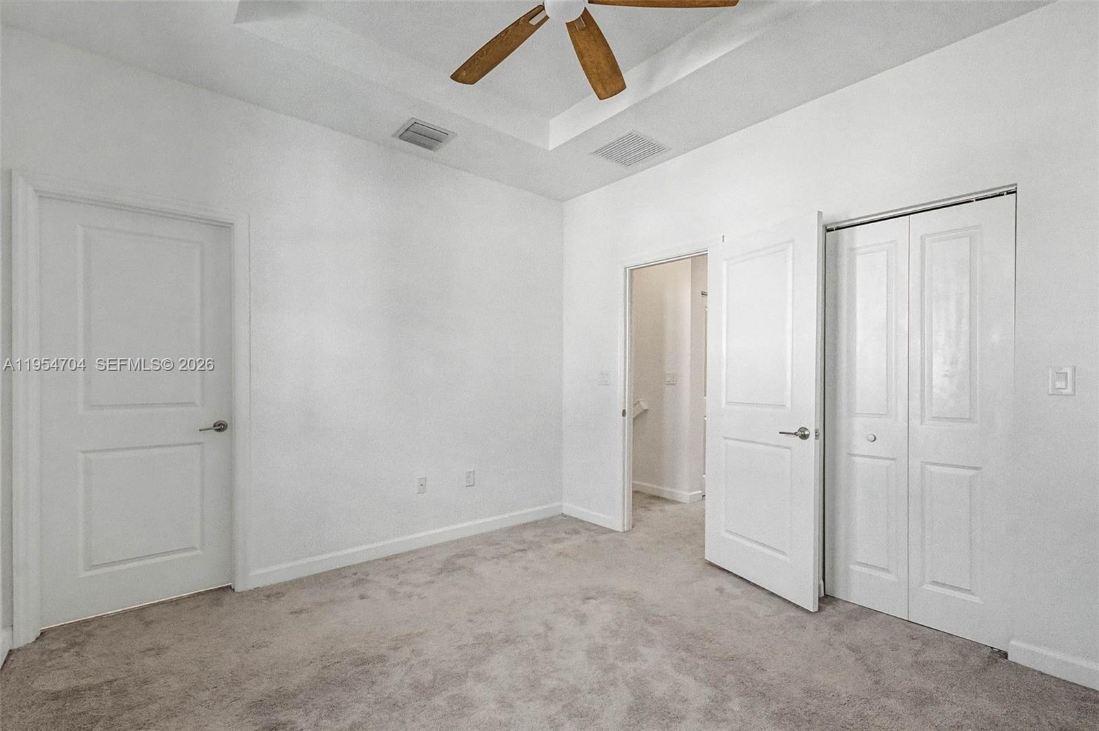 12947 Southwest 234th Street Homestead, FL 33032 - Photo 17 of 33 a view of an empty room