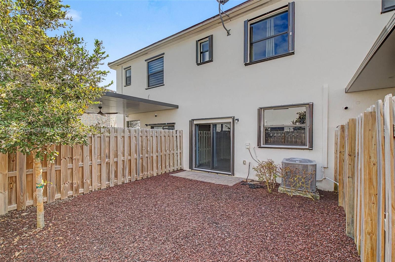 12947 Southwest 234th Street Homestead, FL 33032 - Photo 24 of 33 a view of backyard of house