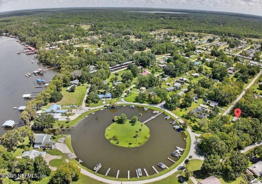 119 Ludwig Avenue Crescent City, FL 32112 - Photo 27 of 31 a view of a swimming pool with a yard and outdoor seating