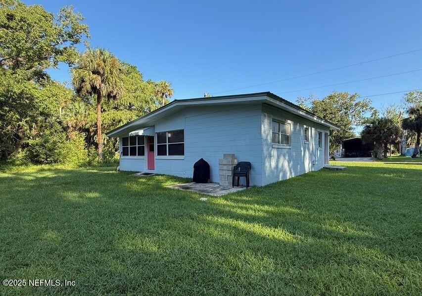 119 Ludwig Avenue Crescent City, FL 32112 - Photo 3 of 31 a view of a house with a yard