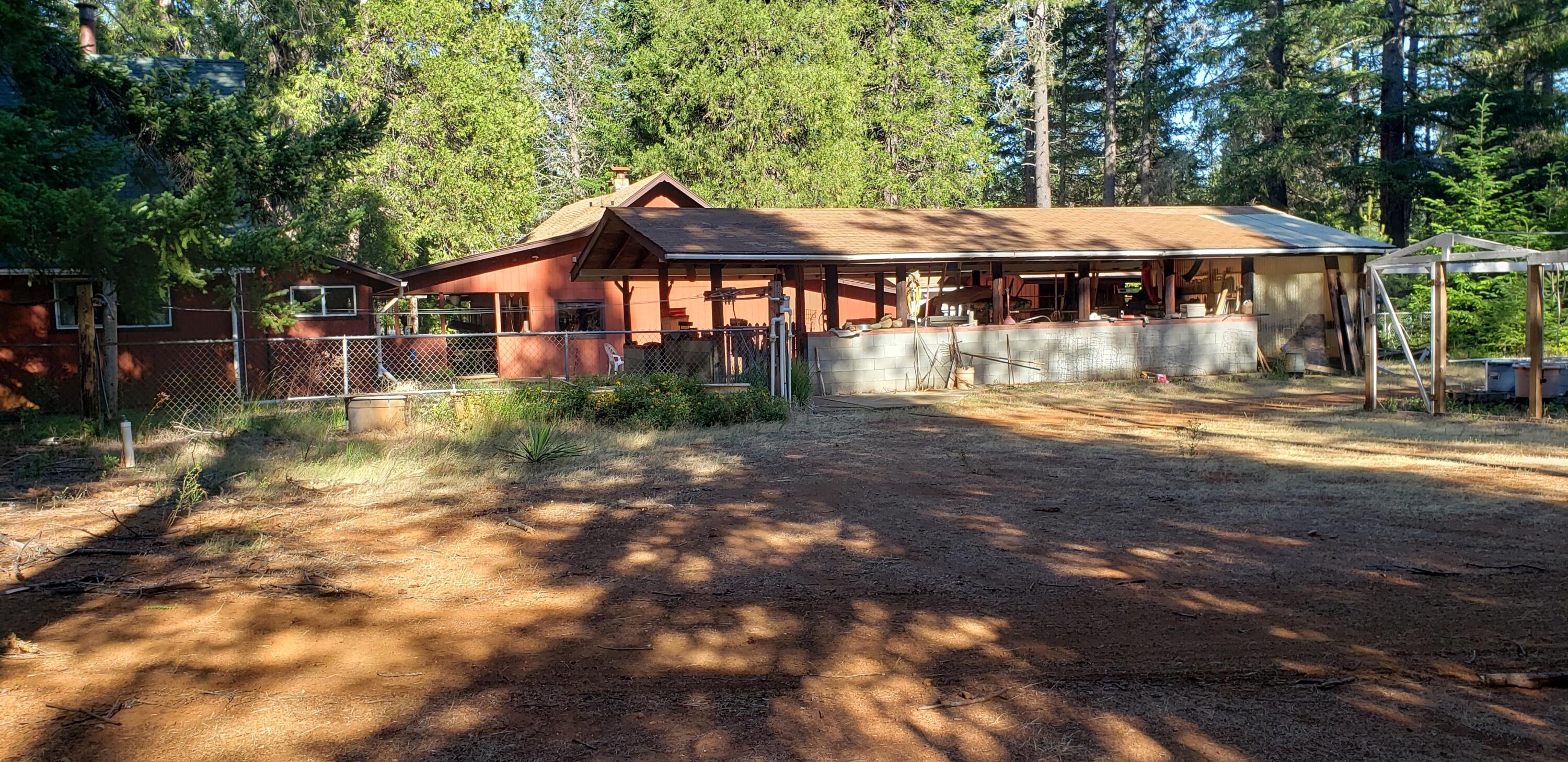 1200 Rough And Ready Creek Road Cave Junction, OR 97523 - Photo 14 of 40 property has so much to offer. Lot of activity can occur on this huge covered patio.
