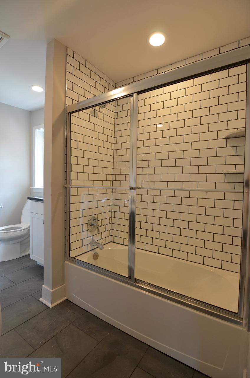 400 West Wayne Avenue, Unit 3 Wayne, PA 19087 - Photo 13 of 14 a bathroom with a shower