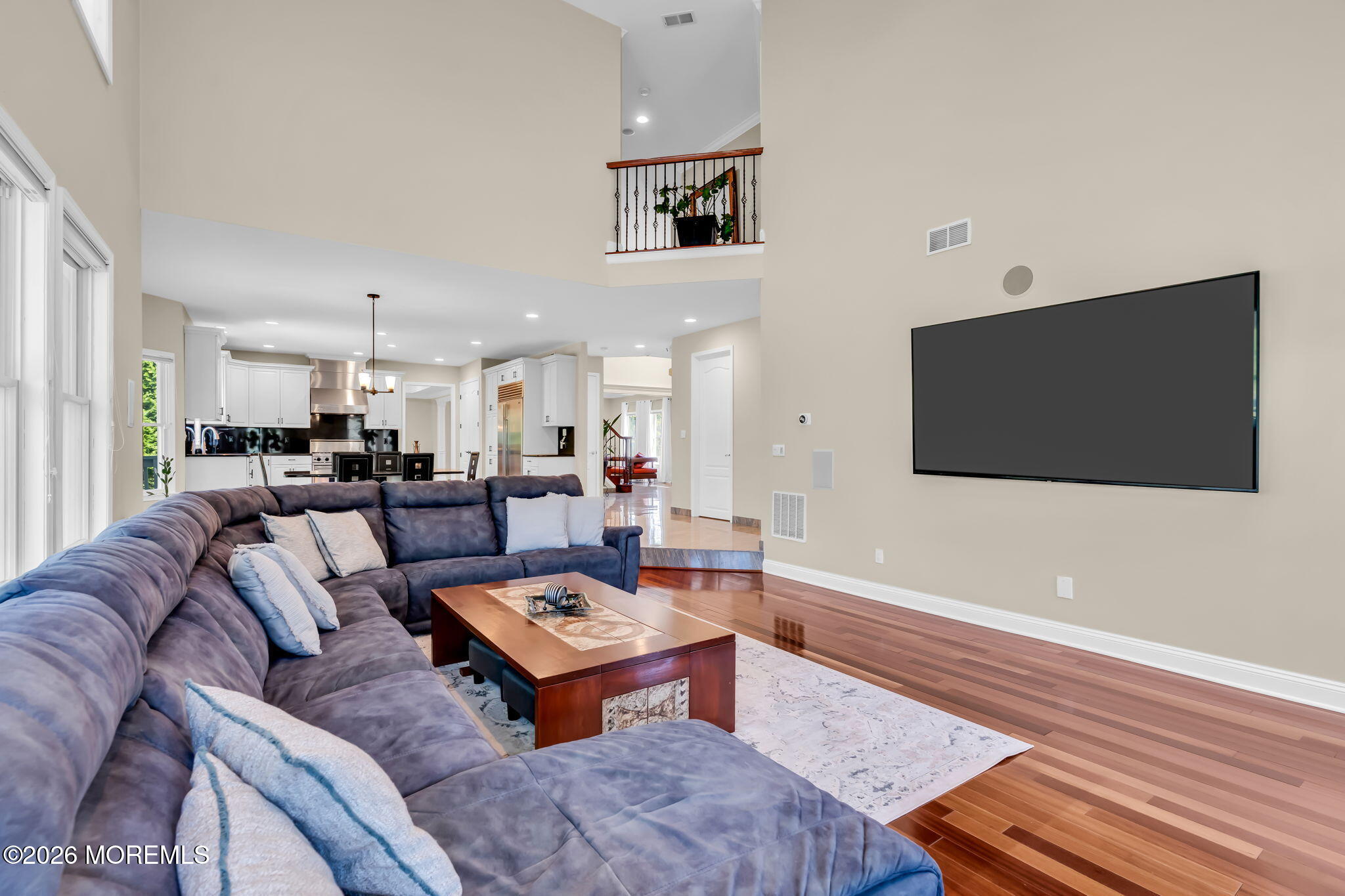 14 Diamond Hill Road Marlboro, NJ 07746 - Photo 63 of 79 a living room with furniture and a flat screen tv