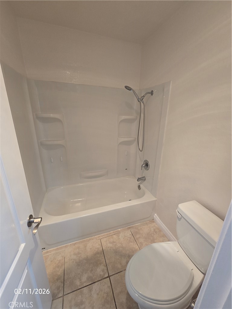 1345 Cabrillo Park, Unit R03 Santa Ana, CA 92701 - Photo 14 of 21 a bathroom with a toilet and a bath tub