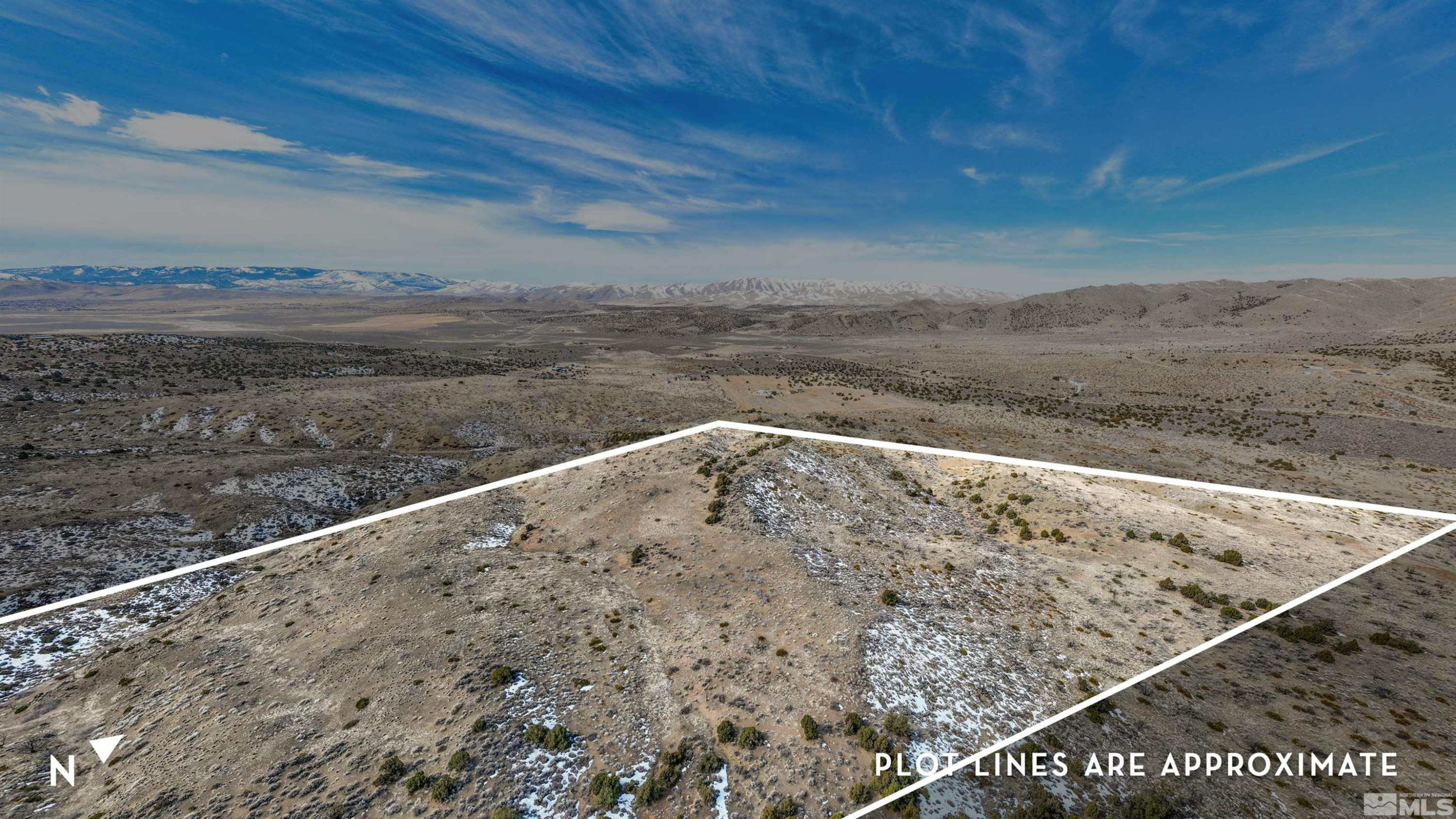 125 Oregon Hills Lane Reno, NV 89506 - Photo 19 of 32 a view of a dry yard with wooden fence