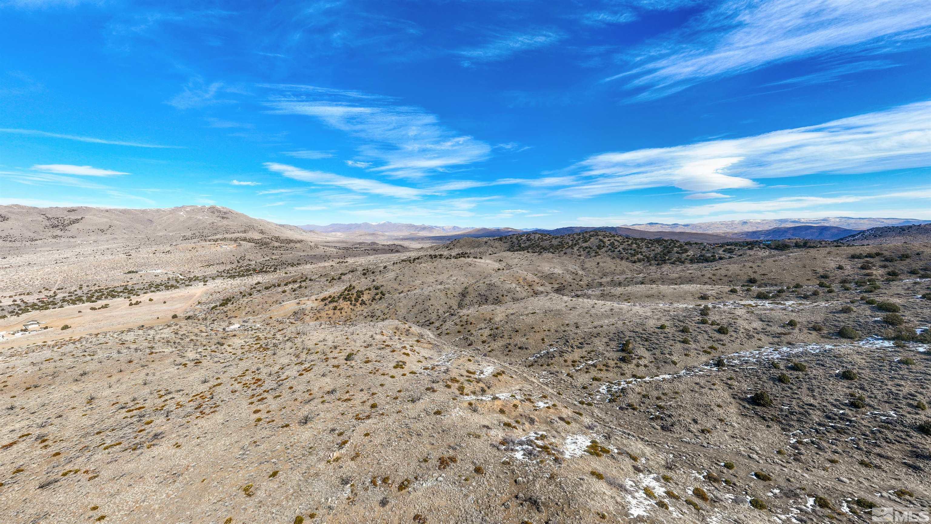 125 Oregon Hills Lane Reno, NV 89506 - Photo 26 of 32 a view of a field with wooden floor