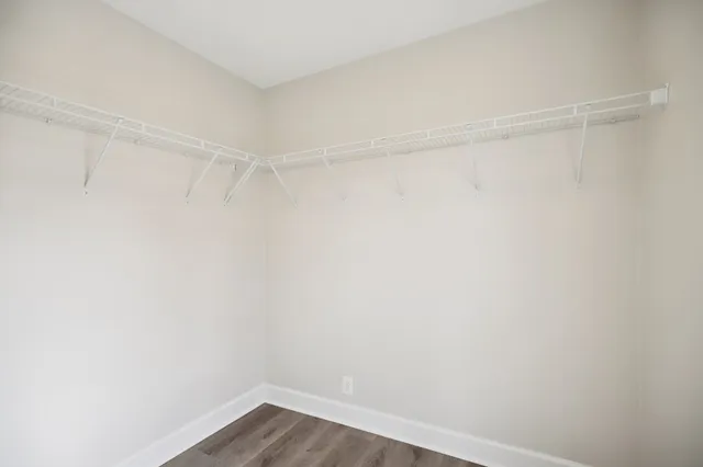 a view of an empty walk in closet