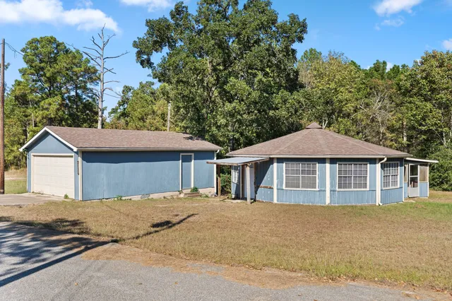 a house with trees in the background