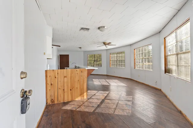 a view of livingroom with furniture and window