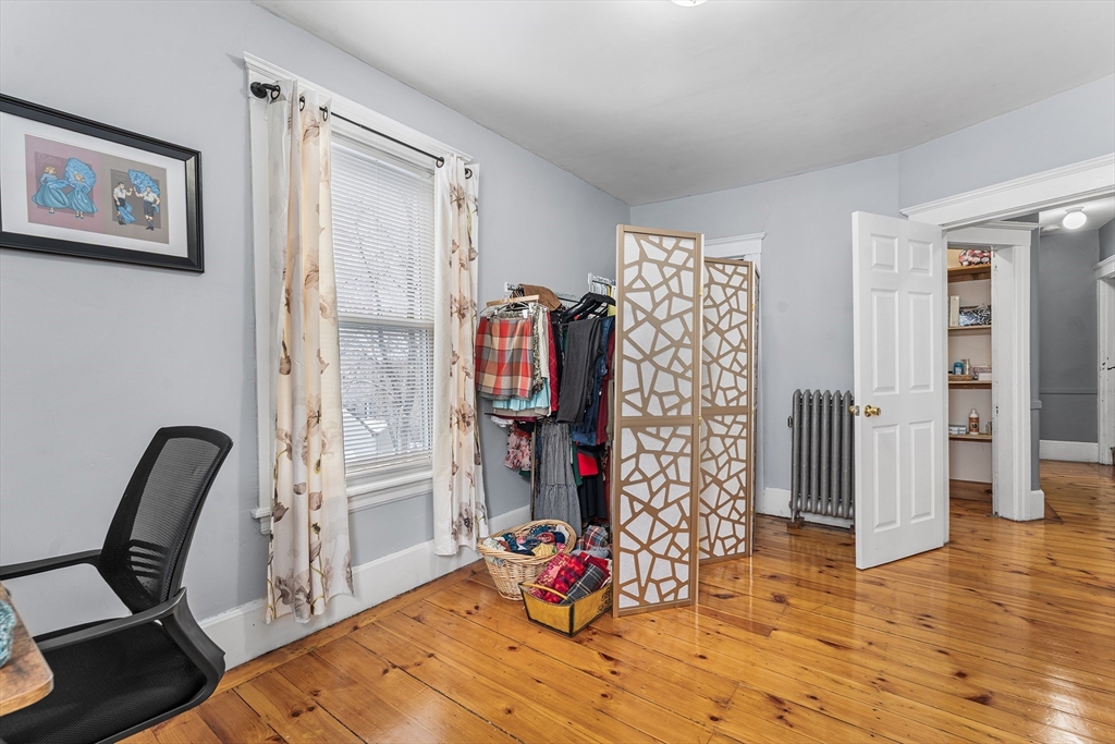 322 Highland Street Worcester, MA 01602 - Photo 18 of 32 a view of a room with gym equipment
