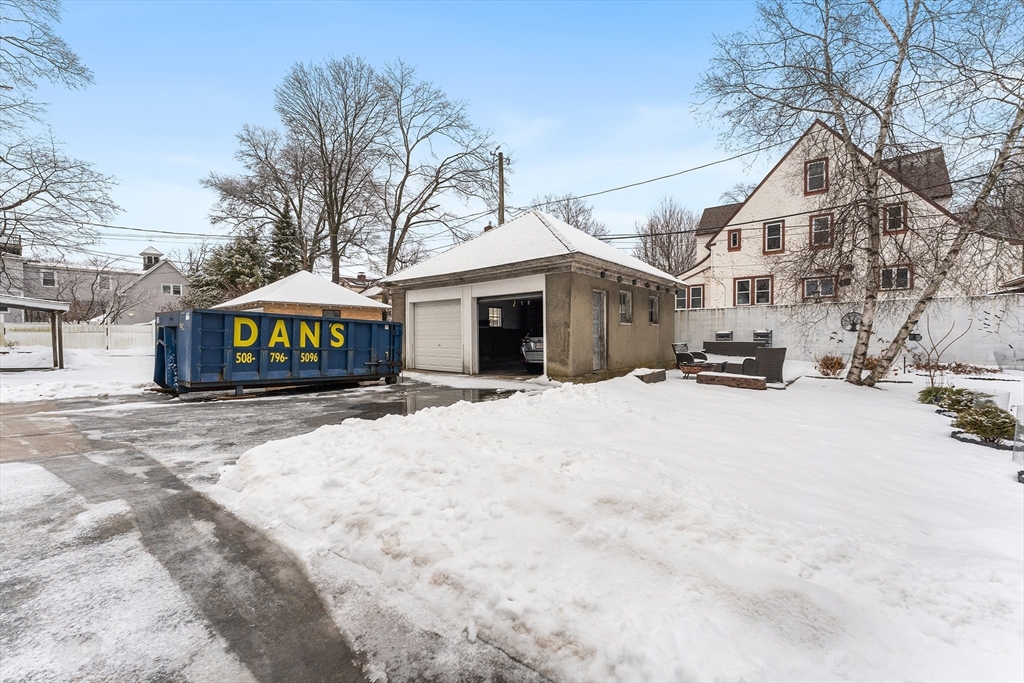 322 Highland Street Worcester, MA 01602 - Photo 28 of 29 a view of a white house with a snow in the road