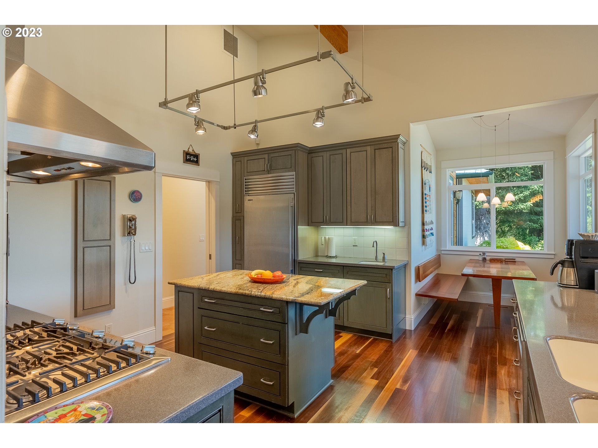 83917 Cloud 9 Road Florence, OR 97439 - Photo 14 of 48 a kitchen view of a dining table chairs and refrigerator