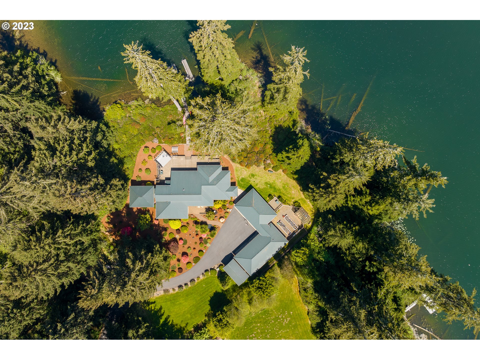 83917 Cloud 9 Road Florence, OR 97439 - Photo 2 of 48 a view of a house with a yard